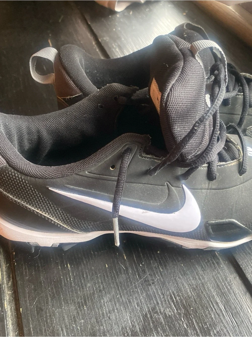 Nike Men’s Black Athletic Cleats with White Swoosh sports cleats
